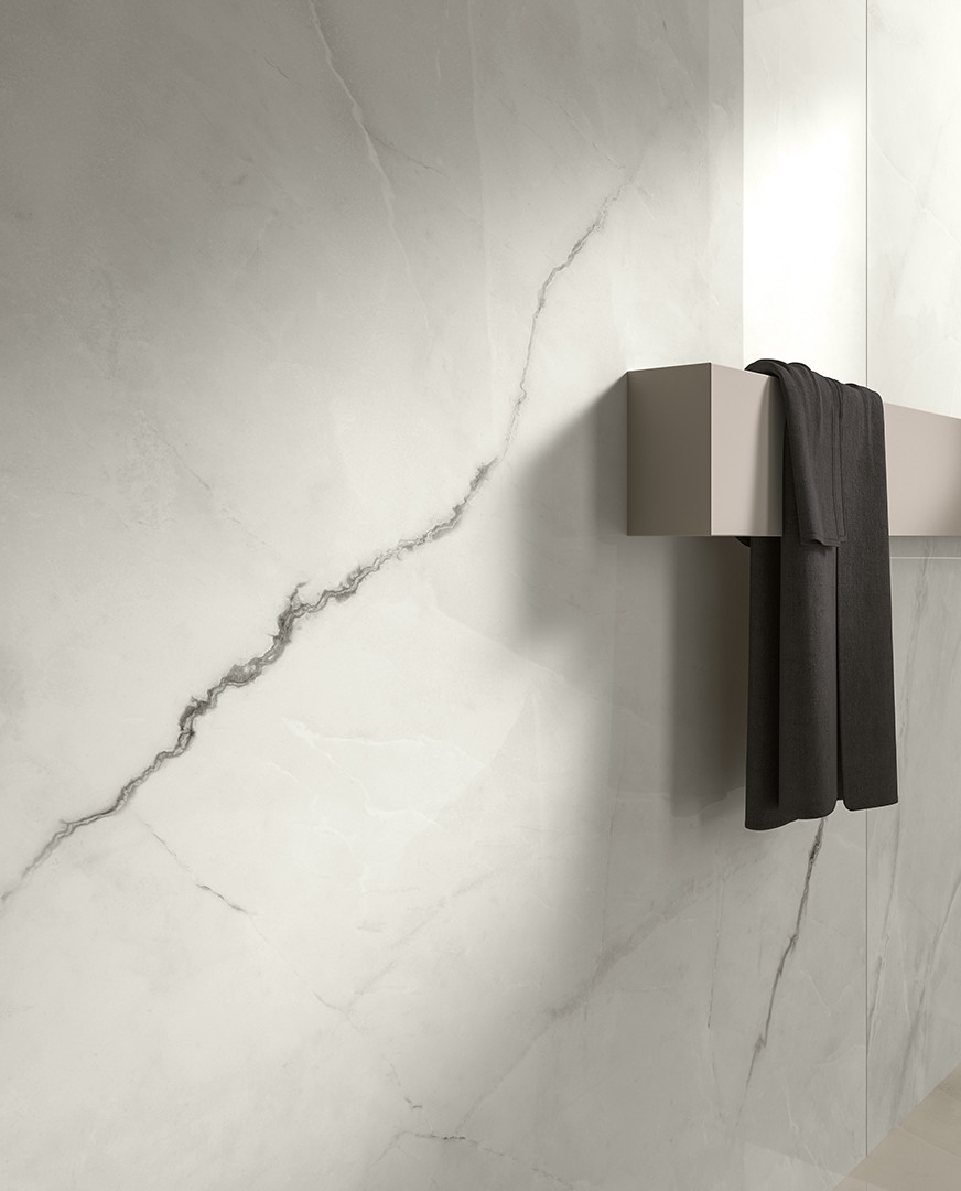 Pavimento in gres porcellanato LUCIDO serie PREMIERE colore ONICE BIANCO