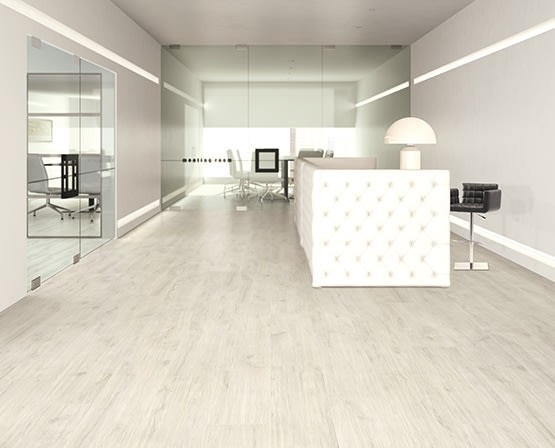 Porcelain tile floor with bleached plank effect wood effect by Casalgrande Padana
